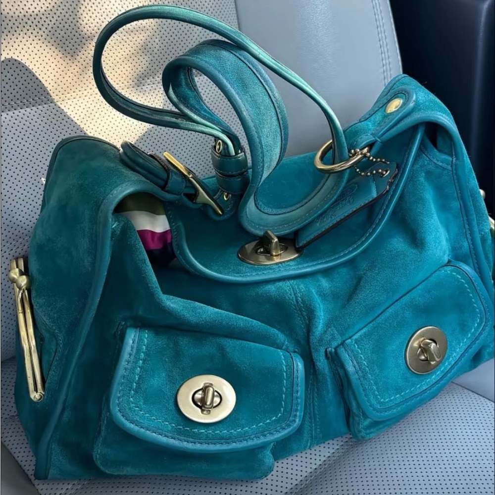 ISO - coach haversack teal blue